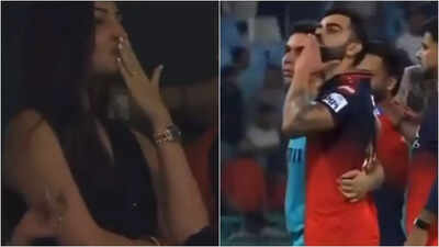 Anushka Sharma blows a kiss to Virat Kohli after RCB’s win; couple’s sweet stadium moment goes viral | Hindi Movie News